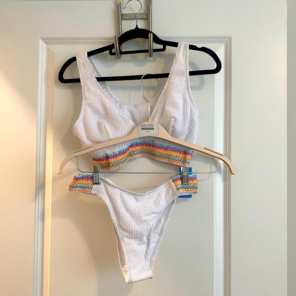 White bikini set with rainbow trim. Cupshe size medium, never worn with tags